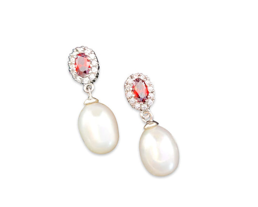 two white elegant pearl stud earrings
