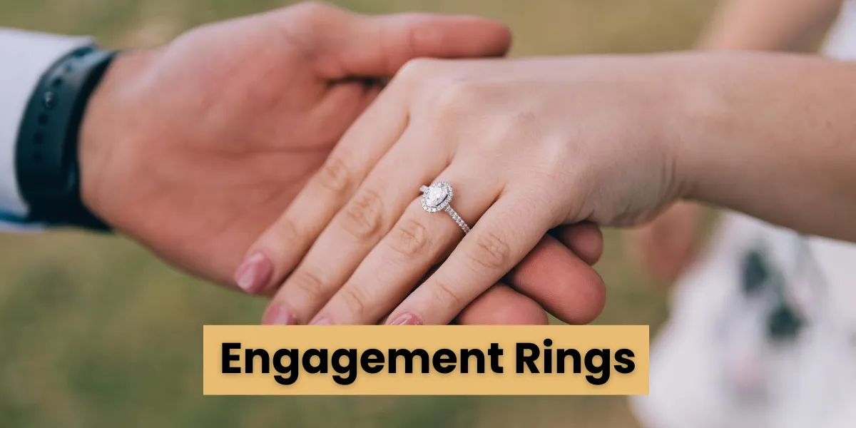 engagement rings in fingers