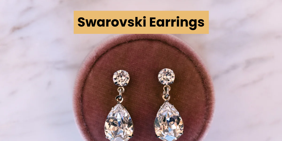 two white swarovski earrings 